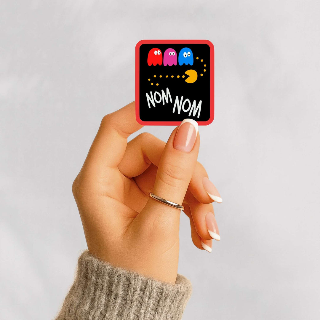 Nom Nom Sticker – Retro Arcade Vinyl Decal, 2.75 x 3 in